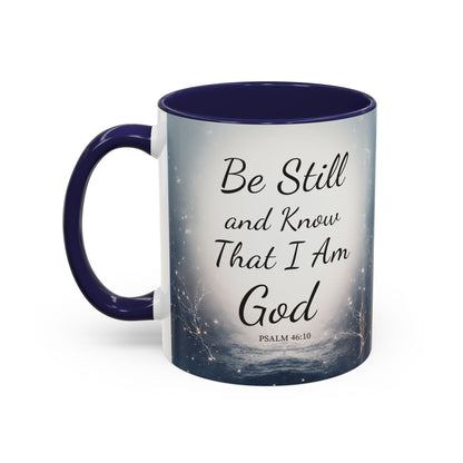Inspirational coffee mug with Psalm 46:10 "Be Still and Know That I Am God" design and navy blue handle and interior