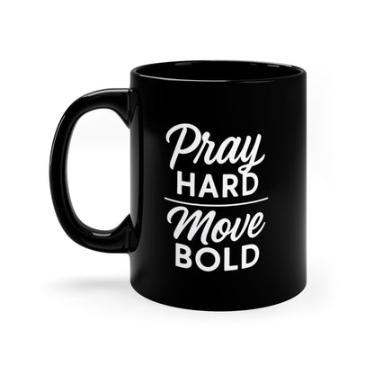Black ceramic coffee mug with white "Pray Hard Move Bold" inspirational text design