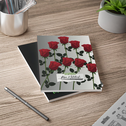 Vintage Rose Lined Notebook with red rose cover and lined pages on wooden desk