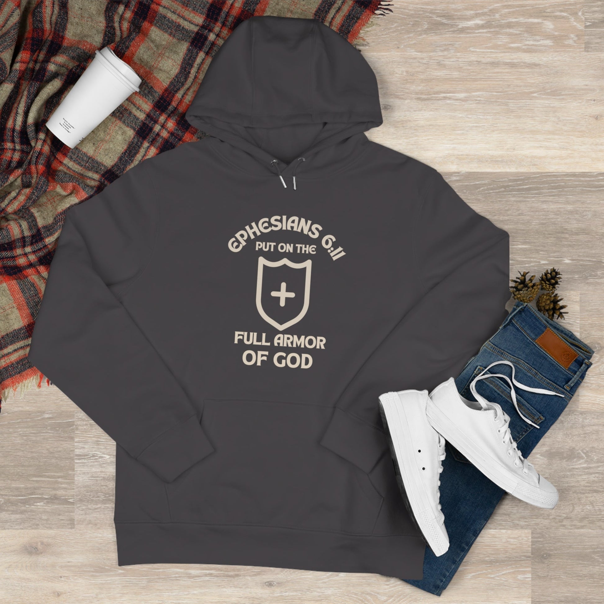 Ephesians 6:11 hoodie with full armor of God text and shield cross design on dark fleece sweatshirt