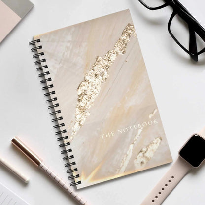 Ruled notes spiral notebook with elegant marble design and metal binding for students and writers